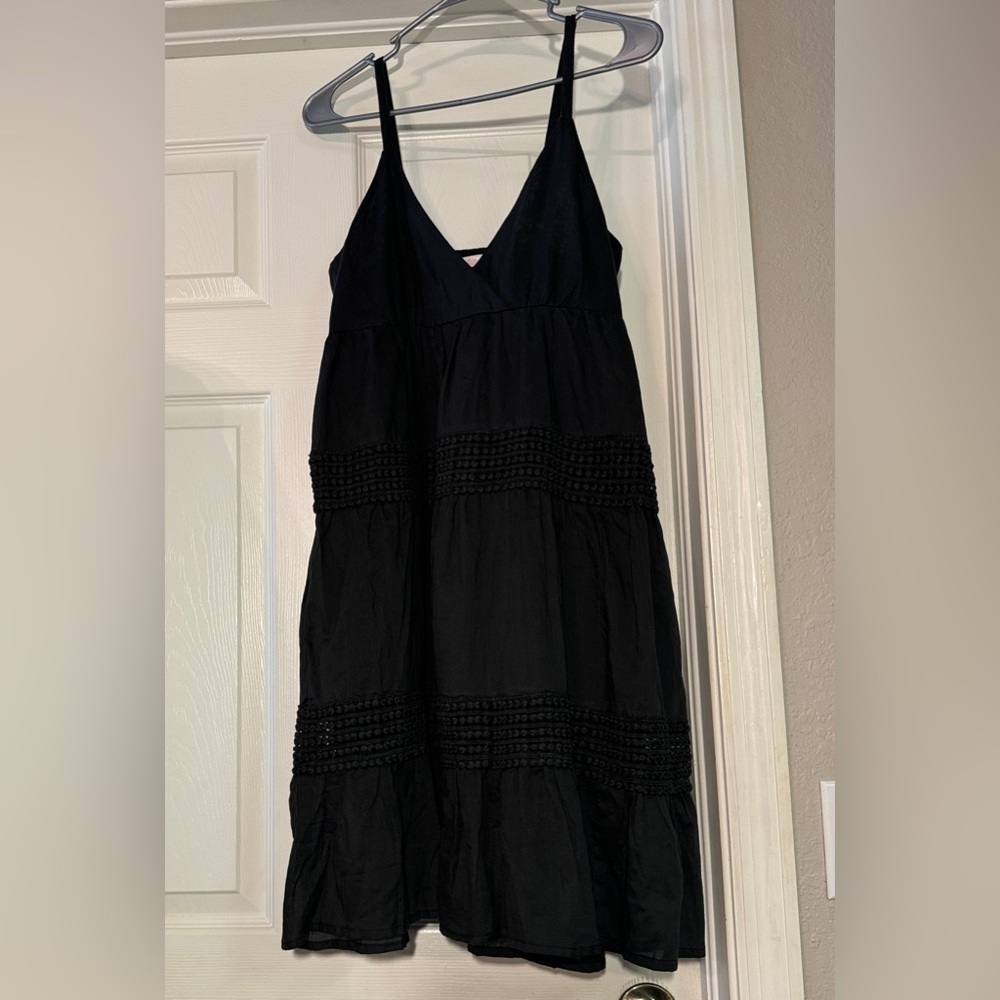 Black sundress fully lined with a smock backing and adjustable straps Size L NWT